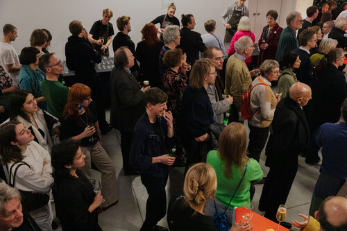 Bezoekers tijdens vernissage van M Leuven